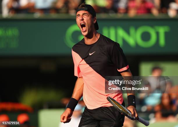 Thanasi Kokkinakis of Australia celebrates the point before match point against Roger Federer of Switzerland in their second round match during the...