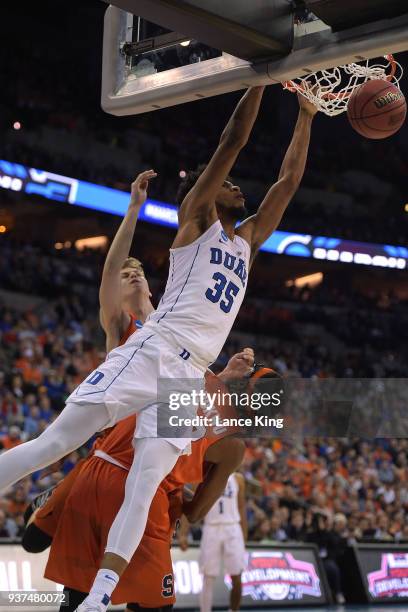 Marvin Bagley III of the Duke Blue Devils dunks the ball against Paschal Chukwu of the Syracuse Orange during the 2018 NCAA Men's Basketball...