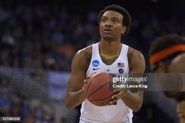 Wendell Carter, Jr. #34 of the Duke Blue Devils concentrates at the free throw line against the Syracuse Orange during the 2018 NCAA Men's Basketball...