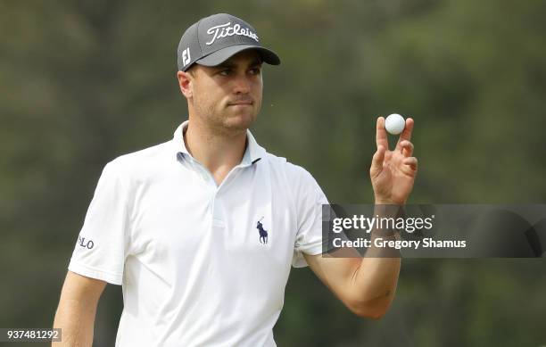 Justin Thomas of the United States reacts on the 14th green during the quarterfinal round of the World Golf Championships-Dell Match Play at Austin...