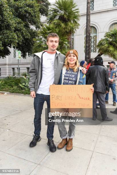 Miles Heizer and Mae Whitman attend March For Our Lives Los Angeles on March 24, 2018 in Los Angeles, California.