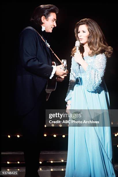 The Johnny Cash Show" - 4/10/70, Johnny Cash and June Carter Cash at the Grand Ole Opry.,