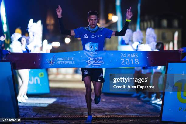 David Gosse of France celebrates winning the half-marathon race during Marathon de Bordeaux Metropole 2018 on March 24, 2018 in Bordeaux, France.