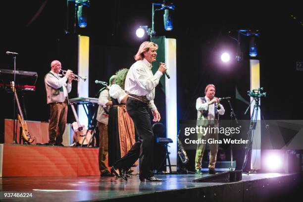 Austrian singer Hans Hinterseer aka Hansi Hinterseer performs live on stage during a concert at the Tempodrom on March 24, 2018 in Berlin, Germany.