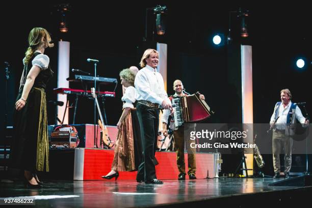 Austrian singer Hans Hinterseer aka Hansi Hinterseer performs live on stage during a concert at the Tempodrom on March 24, 2018 in Berlin, Germany.