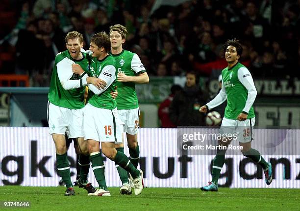 Per Mertesacker of Bremen celebrates with his team mates his team's 2nd goal during the UEFA Europa League Group L match between Werder Bremen and CD...