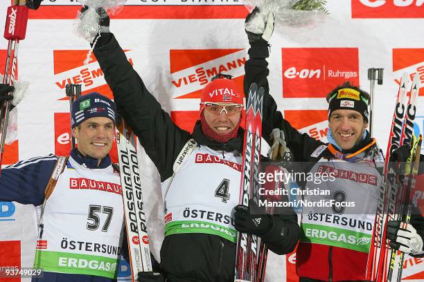 Tim Burge of USA , Emil Hegle Svendsen of Norway and Christoph Sumann of Austria during the Flower Ceremony after the Men's 20 km Individual event in...