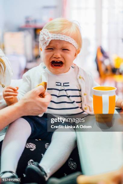 baby crying - new orleans bow stock pictures, royalty-free photos & images