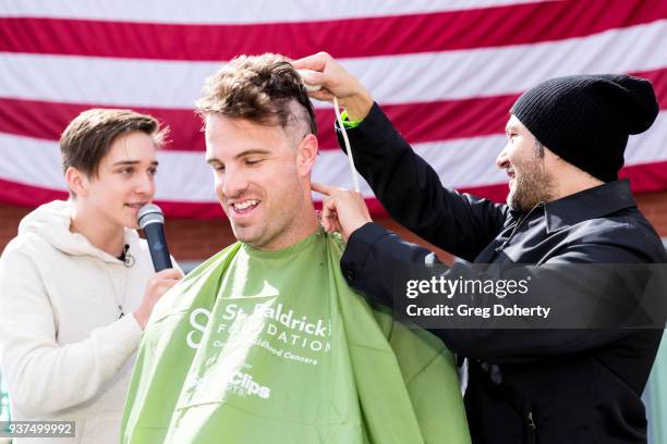 Producer Neil D'monte shaves a head at the St. Baldrick's Foundation Celebrity Event on March 24, 2018 in North Hollywood, California.