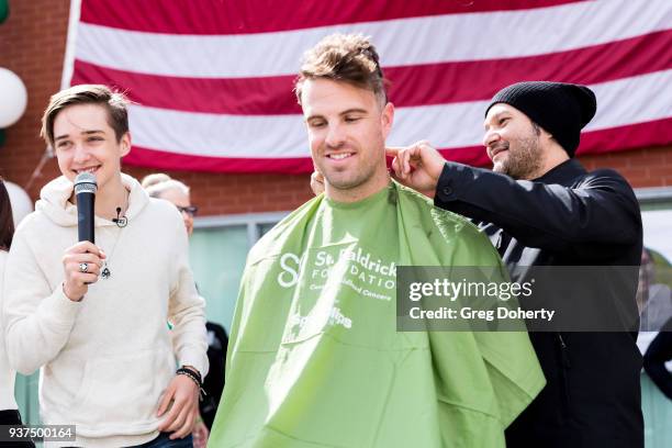 Producer Neil D'monte shaves a head at the St. Baldrick's Foundation Celebrity Event on March 24, 2018 in North Hollywood, California.
