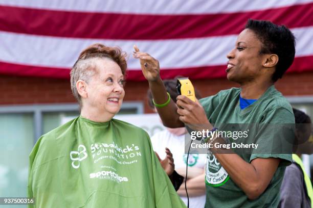 Actress Angelique Bates shaves a head at the St. Baldrick's Foundation Celebrity Event on March 24, 2018 in North Hollywood, California.