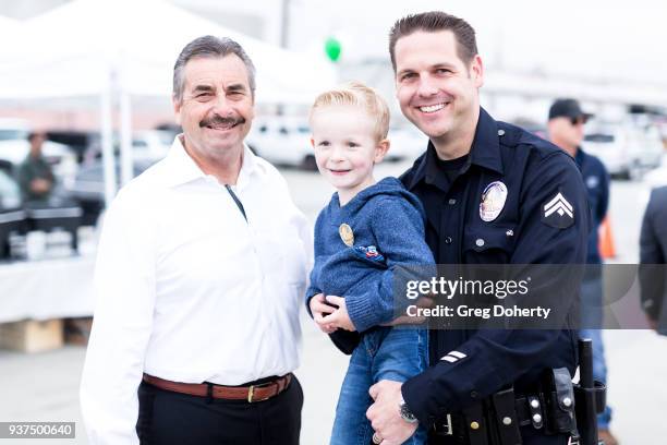 Los Angeles Police Chief Charlie Beck, Parker Sinclair and Nick Sinclair attend the St. Baldrick's Foundation Celebrity Event on March 24, 2018 in...