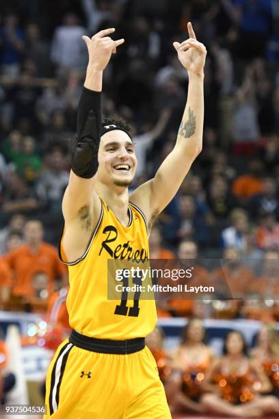 Maura of the UMBC Retrievers celebrates a basket during the first round of the 2018 NCAA Men's Basketball Tournament against the Virginia Cavaliers...