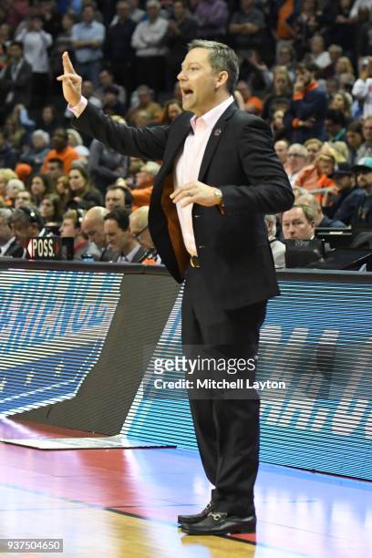 Head coach Ryan Odom of the UMBC Retrievers signals to his players during the first round of the 2018 NCAA Men's Basketball Tournament against the...