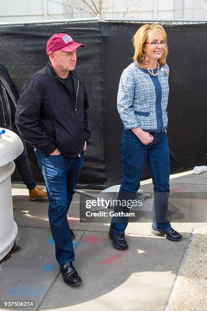 Mark Kelly and Gabrielle Giffords attend the March For Our Lives on March 24, 2018 in Washington City.