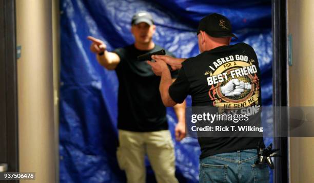 Joe Deedon, former law enforecement officer and owner of Tac*One Consulting , coaches Walter Ames in Deedon's "Lone Wolf" civilian active shooter...