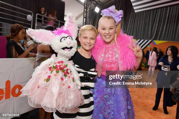Darci Lynne Farmer and JoJo Siwa attend Nickelodeon's 2018 Kids' Choice Awards at The Forum on March 24, 2018 in Inglewood, California.