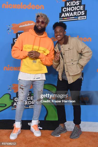 Odell Beckham Jr. And Jaylin Smith attend Nickelodeon's 2018 Kids' Choice Awards at The Forum on March 24, 2018 in Inglewood, California.