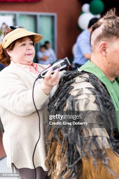 Patrika Darbo shaves the head Chewbacca, AKA Jacob Dewild at the St. Baldrick's Foundation Celebrity Event on March 24, 2018 in North Hollywood,...