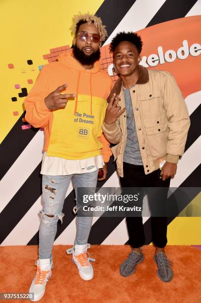 Odell Beckham Jr. And Jaylin Smith attend Nickelodeon's 2018 Kids' Choice Awards at The Forum on March 24, 2018 in Inglewood, California.