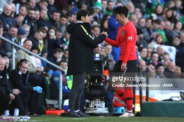 South Korea head coach Shin Tae-yong and Son Heung-min of South Korea during an International Friendly fixture between Northern Ireland and Korea...