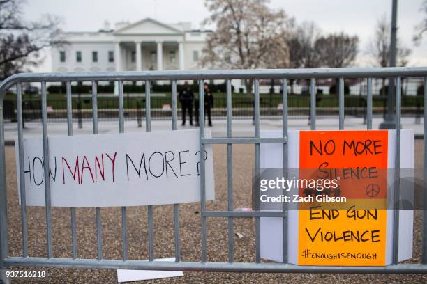 Signs sit near the White House following the March for Our Lives rally March 24, 2018 in Washington, DC. Hundreds of thousands of demonstrators,...