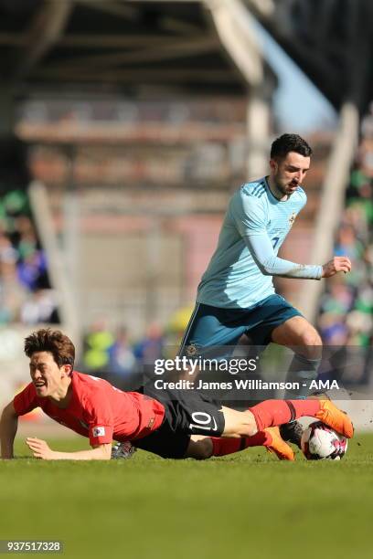 Lee Jae-sung of South Korea and Conor McLaughlin of Northern Ireland during an International Friendly fixture between Northern Ireland and Korea...