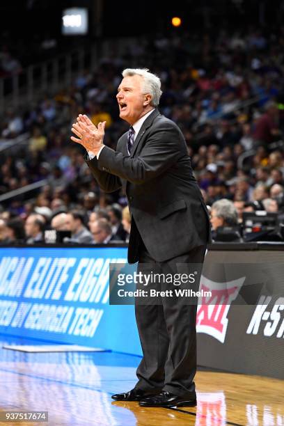 The Kansas State Head Coach Bruce Weber instructs his team during the fourth round of the 2018 NCAA Photos via Getty Images Men's Basketball...