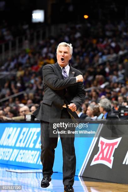 The Kansas State Head Coach Bruce Weber instructs his team during the fourth round of the 2018 NCAA Photos via Getty Images Men's Basketball...
