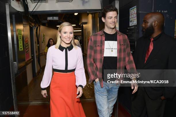 Kristen Bell and Grant Gustin and backstage at Nickelodeon's 2018 Kids' Choice Awards at The Forum on March 24, 2018 in Inglewood, California.