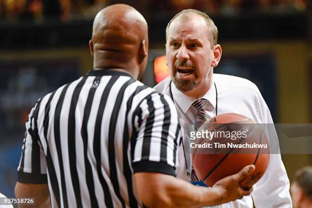 Head coach Paul Sather of Northern State University speaks with an official during the Division II Men's Basketball Championship held at the Sanford...