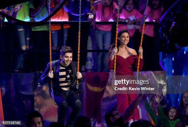 Jack Griffo and Kira Kosarin speak onstage at Nickelodeon's 2018 Kids' Choice Awards at The Forum on March 24, 2018 in Inglewood, California.