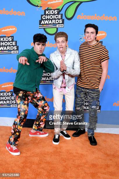 Emery Kelly, Ricky Garcia, and Liam Attridge of music group Forever in Your Mind attend Nickelodeon's 2018 Kids' Choice Awards at The Forum on March...