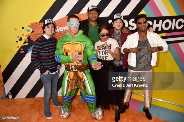 Josh Brener, host John Cena, Omar Benson Miller, Kat Graham, Ben Schwartz, and Brandon Mychal Smith attend Nickelodeon's 2018 Kids' Choice Awards at...