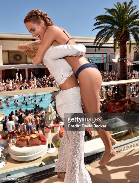 Models Camille Kostek and Haley Kalil attend Sports Illustrated Swimsuit new issue launch and model search winners celebration at Encore Beach Club...