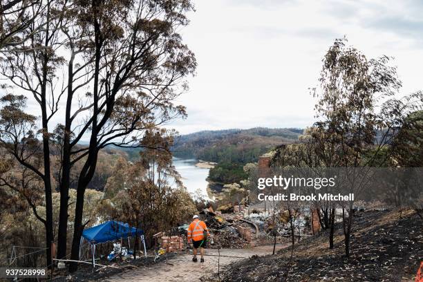 The remains of a house on Thompsons Drive on March 25, 2018 in Tathra, Australia. A bushfire which started on 18 March destroyed 65 houses, 35...