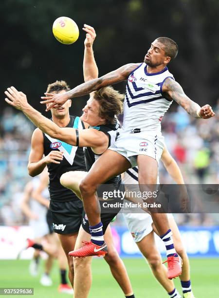 Bradley Hill of the Dockers spoils Jared Polec of Port Adelaide during the round one AFL match between the Port Adelaide Power and the Fremantle...