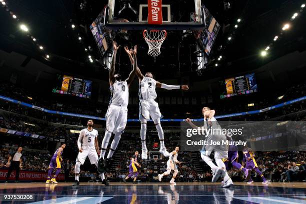 JaMychal Green and Kobi Simmons of the Memphis Grizzlies jump for the rebound against the Los Angeles Lakers on March 24, 2018 at FedExForum in...