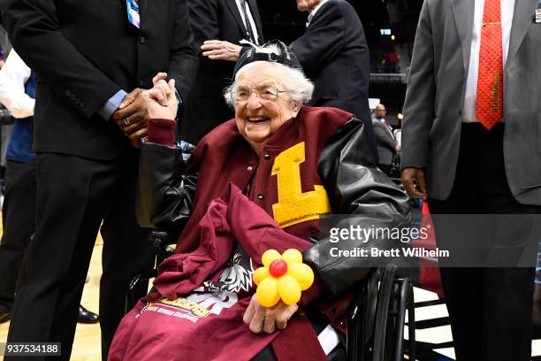 Sister Jean and the Loyola Chicago Ramblers celebrate their win over Kansas State Wildcats in the fourth round of the 2018 NCAA Photos via Getty...