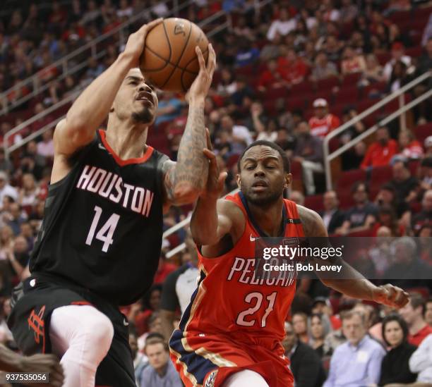 Gerald Green of the Houston Rockets drives on Darius Miller of the New Orleans Pelicans at Toyota Center on March 24, 2018 in Houston, Texas. NOTE TO...