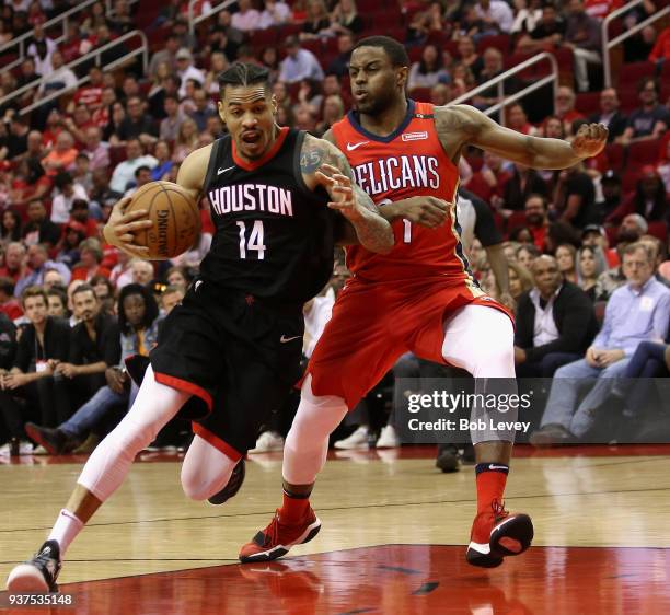 Gerald Green of the Houston Rockets drives on Darius Miller of the New Orleans Pelicans at Toyota Center on March 24, 2018 in Houston, Texas. NOTE TO...