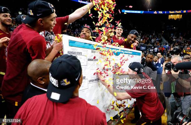 Ben Richardson of the Loyola Ramblers celebrates after defeating the Kansas State Wildcats during the 2018 NCAA Men's Basketball Tournament South...