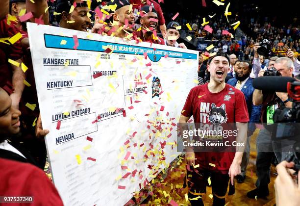 Ben Richardson of the Loyola Ramblers celebrates after defeating the Kansas State Wildcats during the 2018 NCAA Men's Basketball Tournament South...