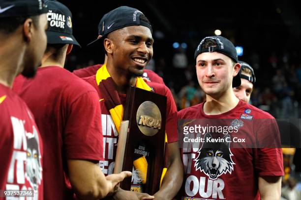 Ben Richardson of the Loyola Ramblers celebrates after defeating the Kansas State Wildcats during the 2018 NCAA Men's Basketball Tournament South...