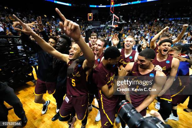 The Loyola Ramblers celebrate after defeating the Kansas State Wildcats during the 2018 NCAA Men's Basketball Tournament South Regional at Philips...