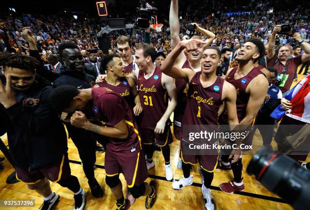 The Loyola Ramblers celebrate after defeating the Kansas State Wildcats during the 2018 NCAA Men's Basketball Tournament South Regional at Philips...