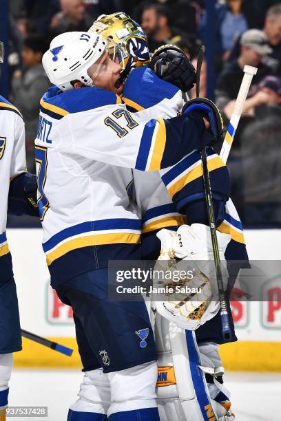 Jaden Schwartz of the St. Louis Blues celebrates with goaltender Jake Allen of the St. Louis Blues after defeating the Columbus Blue Jackets 2-1 in a...