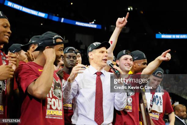 The Loyola Ramblers celebrate after defeating the Kansas State Wildcats during the 2018 NCAA Men's Basketball Tournament South Regional at Philips...