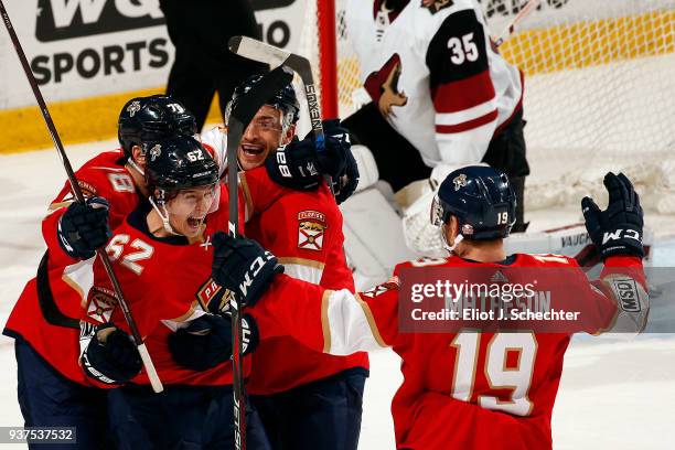 Denis Malgin of the Florida Panthers celebrates his game winning goal with teammates against the Arizona Coyotes at the BB&T Center on March 24, 2018...