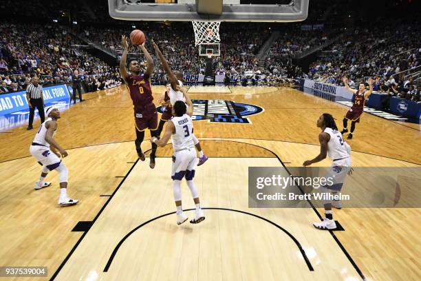Donte Ingram of the Loyola Chicago Ramblers puts up a shot over Kamau Stokes of the Kansas State Wildcats during the fourth round of the 2018 NCAA...